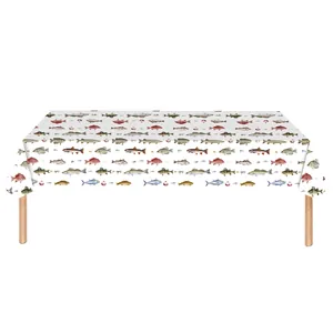 Detailed view of white rectangular tablecloth with realistic fish and fishing buoy prints