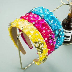 Close-up of luxury headbands with colorful rhinestones, beads and crystals for Independence Day