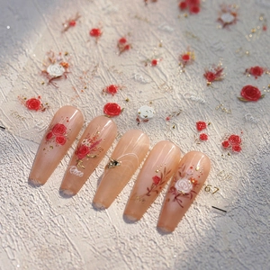 3D embossed rose flower nail stickers with gold accents on nude coffin press-on nails