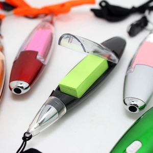 Detail showing creative ballpoint pen with built-in sticky notes and a portable lanyard
