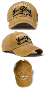 Detailed views of vintage mustard yellow cotton baseball cap with New York embroidery