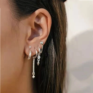 Minimalist S925 silver textured C-shaped hoop earrings and geometric studs set on model