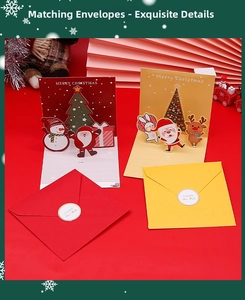 Close-up of 3D Christmas cards featuring pop-up Santa and tree with matching envelopes