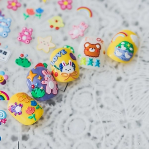 5D embossed nail stickers featuring cute cartoon bears and rainbows in bright yellow and purple