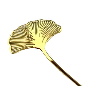 Golden acrylic ginkgo leaf cake topper decoration with elegant hollowed-out metal texture