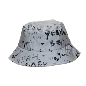 Grey luminous bucket hat with black BABY and YEAH graffiti patterns for outdoor sun protection