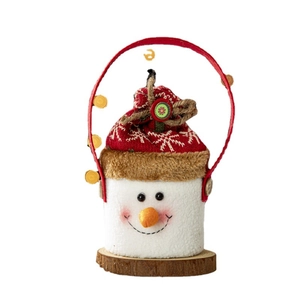 Christmas snowman gift basket with red knit handle and rustic wooden base for holiday treats