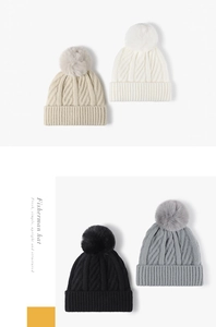 Cozy thick knitted winter beanies for women in multiple colors with soft faux fur pom-poms