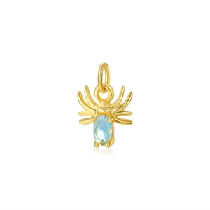 Detailed view of a gold-plated spider charm featuring a light blue oval gemstone inlay