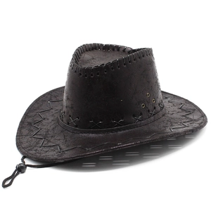 Detail of dark brown cowboy hat with vintage texture, cross stitching and metal eyelets