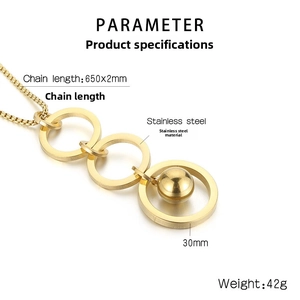 Detail of gold titanium steel necklace with three interlocking rings and round bead pendant