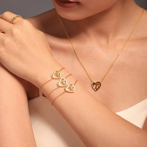 Parure en acier doré avec pendentif cœur soleil et lune, zircone et chaînes étagées
