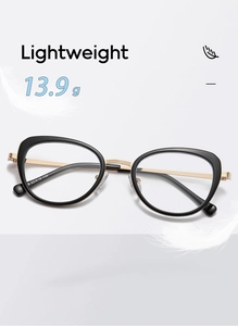 Detail of lightweight black and gold cat-eye frame showing the 13.9g weight and hinges