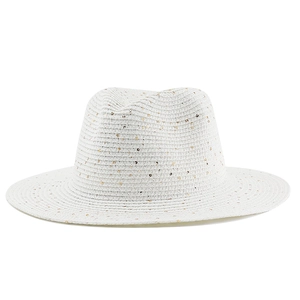 Close-up of white woven straw hat featuring shimmering gold sequins on the brim
