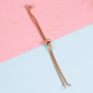 Macro view of rose gold stainless steel bolo chain with round slider adjustment bead