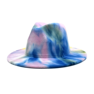 Detailed close-up of a tie-dye wool fedora hat with vibrant blue and purple textures