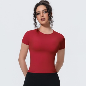 Close-up of red slim fit yoga t-shirt showing breathable elastic fabric texture