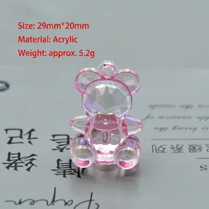Macro detail of a 29mm pink aurora acrylic bear pendant for DIY jewelry making