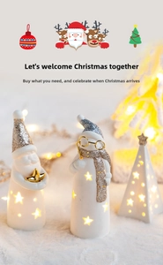 Close-up of glowing ceramic Santa, snowman, and star figurines with warm LED lighting