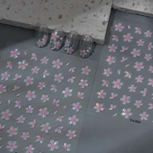 Detail of 3D embossed pink cherry blossom nail stickers with aurora luster and pearls