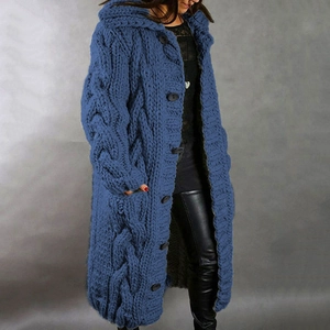 Detailed cable knit pattern on dark blue long hooded cardigan sweater with buttons