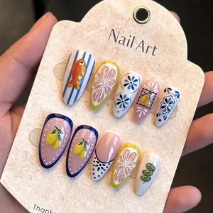 Nail art set with 3D embossed lemon and goldfish designs in blue and yellow colors