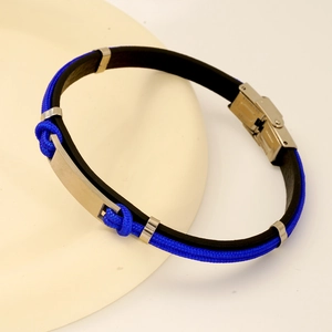 Detailed shot of anchor bracelet showing blue woven cord and stainless steel metal clasp