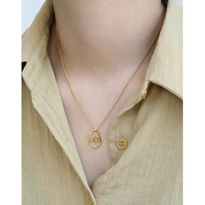 Minimalist S925 sterling silver heart necklace with gold irregular spiral pendant on model