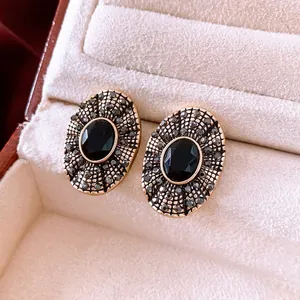 Vintage oval baroque earrings with black stone and rhinestones in gold setting