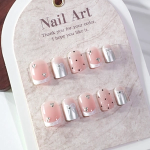 Cat-Eye Kunstnägel zum Aufkleben mit Punkten, Schleifen und Strasssteinen in Pink und Silber