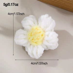Detail view of a 4cm diameter knitted flower accessory weighing 5g for hair clips