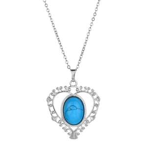 Pendentif coeur en argent avec pierre turquoise et filigrane sur fond blanc
