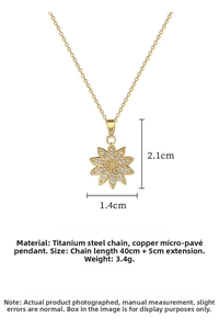 Detail view of gold sunflower pendant with micro-pave crystals and 40cm plus 5cm chain