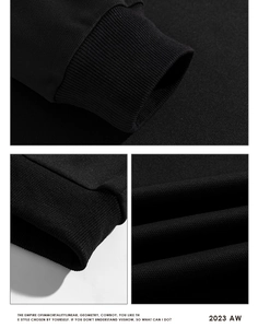 Détail des poignets côtelés et de l'ourlet d'un sweat-shirt noir homme pour l'automne hiver