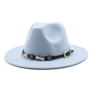 Macro view of light blue wool fedora with brown leather belt and silver star studs