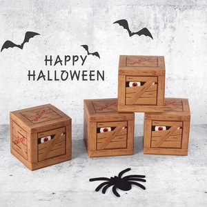 Halloween gift box with wood grain pattern and monster eye design for candy packaging