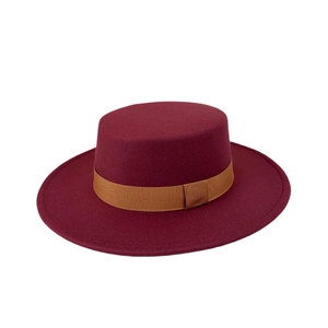 Classic burgundy flat top wool boater hat featuring a stylish brown grosgrain ribbon band