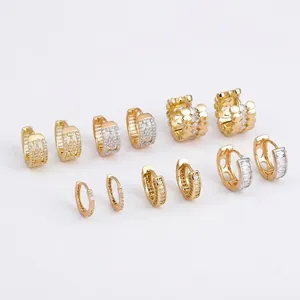 Elegant gold-plated hoop earring set with hollow heart designs and sparkling cubic zirconia