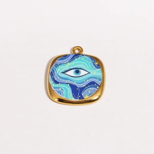 Macro view of square gold-rimmed pendant featuring a blue enamel oil painting evil eye design