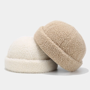 Winter teddy fleece dockers cap in cream and khaki colors with warm thick texture