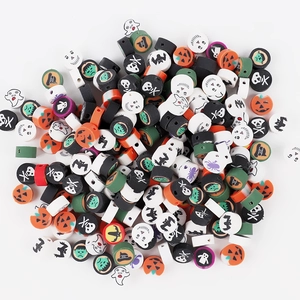 Handmade Halloween clay beads featuring pumpkin, skull and ghost patterns for DIY jewelry