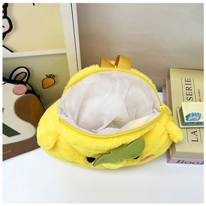 Detail of yellow plush cartoon bag showing interior mesh lining and zipper closure