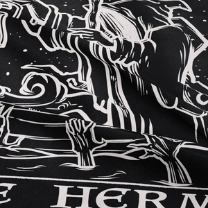 Close-up of The Hermit tarot tapestry showing fine woven texture and black ink printing