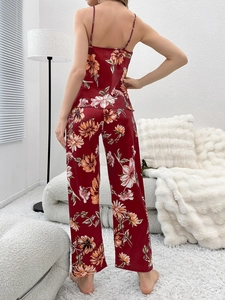 Rear view of floral satin loungewear set featuring adjustable straps and smooth fabric