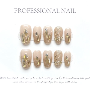 Champagne gold press-on nails set with luxury 3D rhinestones and glitter finish