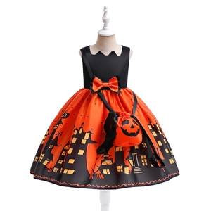 Detail of Halloween girl's sleeveless pumpkin dress with haunted house print and bag