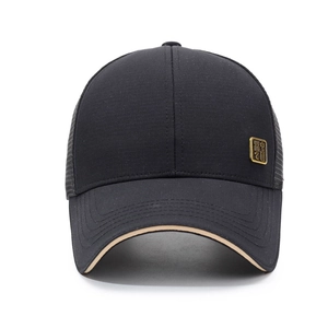 Classic black trucker hat with breathable mesh and vintage gold Chinese metal badge