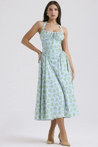 Close-up of light blue floral midi dress with lace trim and delicate halter neckline