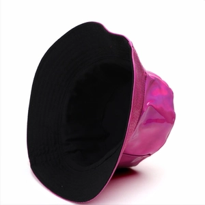 Detail showing bright pink laser gradient PU leather bucket hat with glossy metallic finish