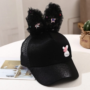 Detail of girls' black sun hat featuring breathable mesh and large lace rabbit ears